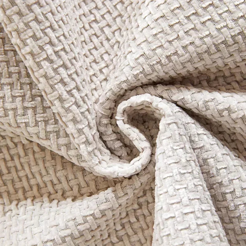 Renove sua sala com a Branquille™, a capa para sofá feita em tecido chenille premium com acabamento elegante e base antiderrapante. Da lojaorganizeja.com