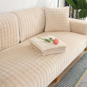 A Capa de Sofá Veludo Xadrez Pelúcia Antiderrapante Velvess™ é a união perfeita entre conforto luxuoso e proteção completa. Da lojaorganizeja.com