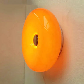 Transforme seus ambientes com o estilo minimalista e contemporâneo do Abajur/Arandela LED Donut Light. Da lojaorganizeja.com