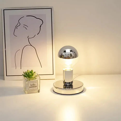 Eleve a decoração do seu ambiente com o Abajur LED Screw Lamps, uma peça que combina funcionalidade e design minimalista. Da lojaorganizeja.com