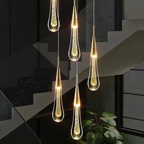 Eleve o design da sua casa com a elegância cristalina da Luminária Pendente Quartz Glass LED. Da lojaorganizeja.com