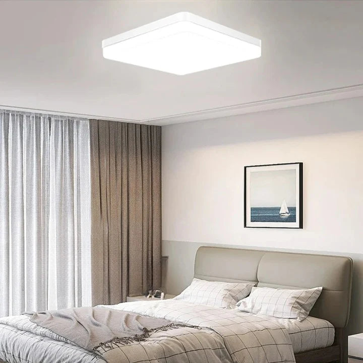 A Luminária de Teto Quadrada Moderna LED Bivolt combina funcionalidade com um design elegante e contemporâneo. Da lojaorganizeja.com