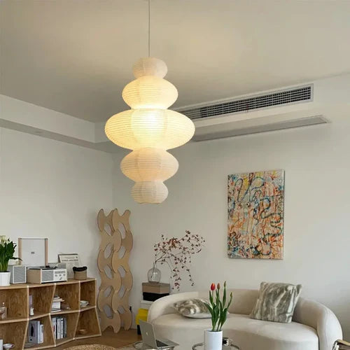 Transforme seu ambiente com o Lustre LED WaveForm, onde curvas elegantes e tecnologia moderna se encontram para criar um efeito visual deslumbrante. Da lojaorganizeja.com