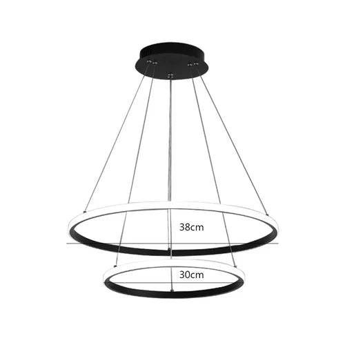 Transforme sua sala de estar ou jantar com a elegância moderna do Lustre Pendente Orbital Duplo em Led. Da lojaorganizeja.com