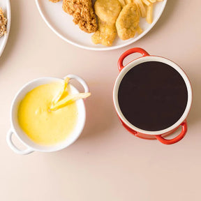 Prepare-se para uma experiência gastronômica única com a nossa Panela de Fondue de Queijo e Chocolate de Cerâmica. Da lojaorganizeja.com