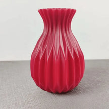  O Vaso Decorativo para Sala de Flor Nordic traz o charme e a simplicidade do estilo escandinavo para a sua mesa.  Da lojaorganizeja.com