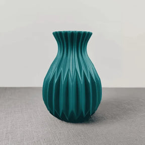  O Vaso Decorativo para Sala de Flor Nordic traz o charme e a simplicidade do estilo escandinavo para a sua mesa.  Da lojaorganizeja.com