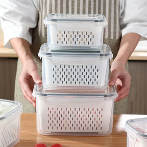 A Caixa de Armazenamento de Geladeira com Cesta de Drenagem, a solução inteligente para manter seus alimentos frescos e sua geladeira organizada. Da loja lojaorganizeja.com
